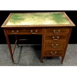 An Edwardian mahogany desk, leather inlaid top, long drawer over kneehole, four adjacent graduated
