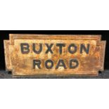 A cast iron road sign, BUXTON ROAD, 33cm x 79cm