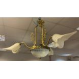 A gilt metal three branch ceiling lamp, opaque glass shades
