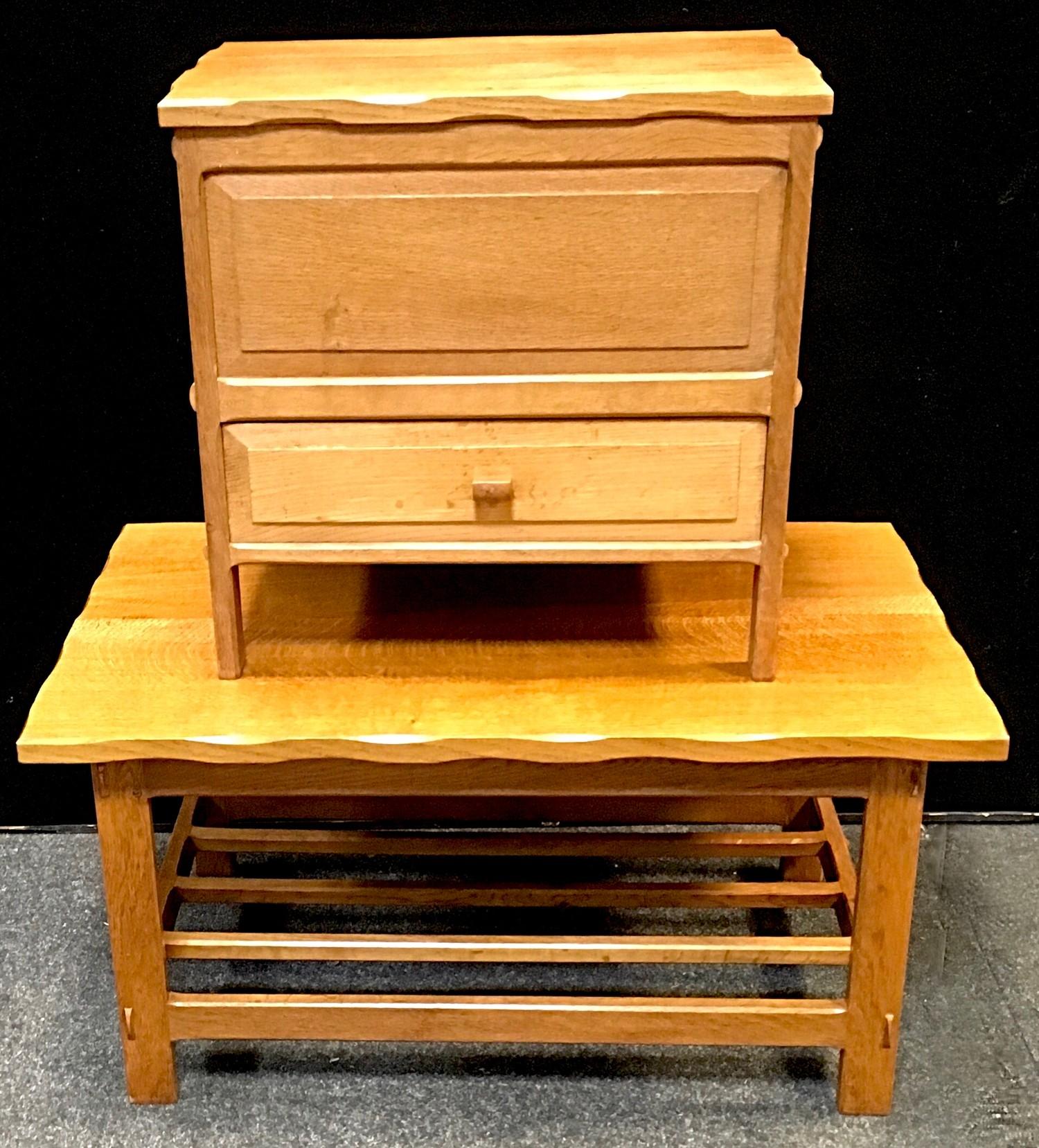 A light oak coffee table with pegged joints, slatted under tier, maker?s mark AL 1980 carved to