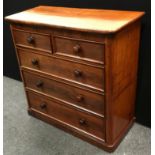 A Victorian mahogany splitter chest of two short drawers over three graduated long, button