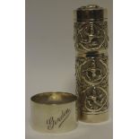 Silver - an Indian silver coloured metal scroll case, embossed with assorted deities each within