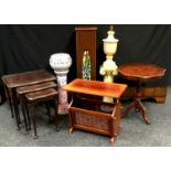 An Italian style inlaid tripod table, shaped circular top; nest of three mahogany tables, glass