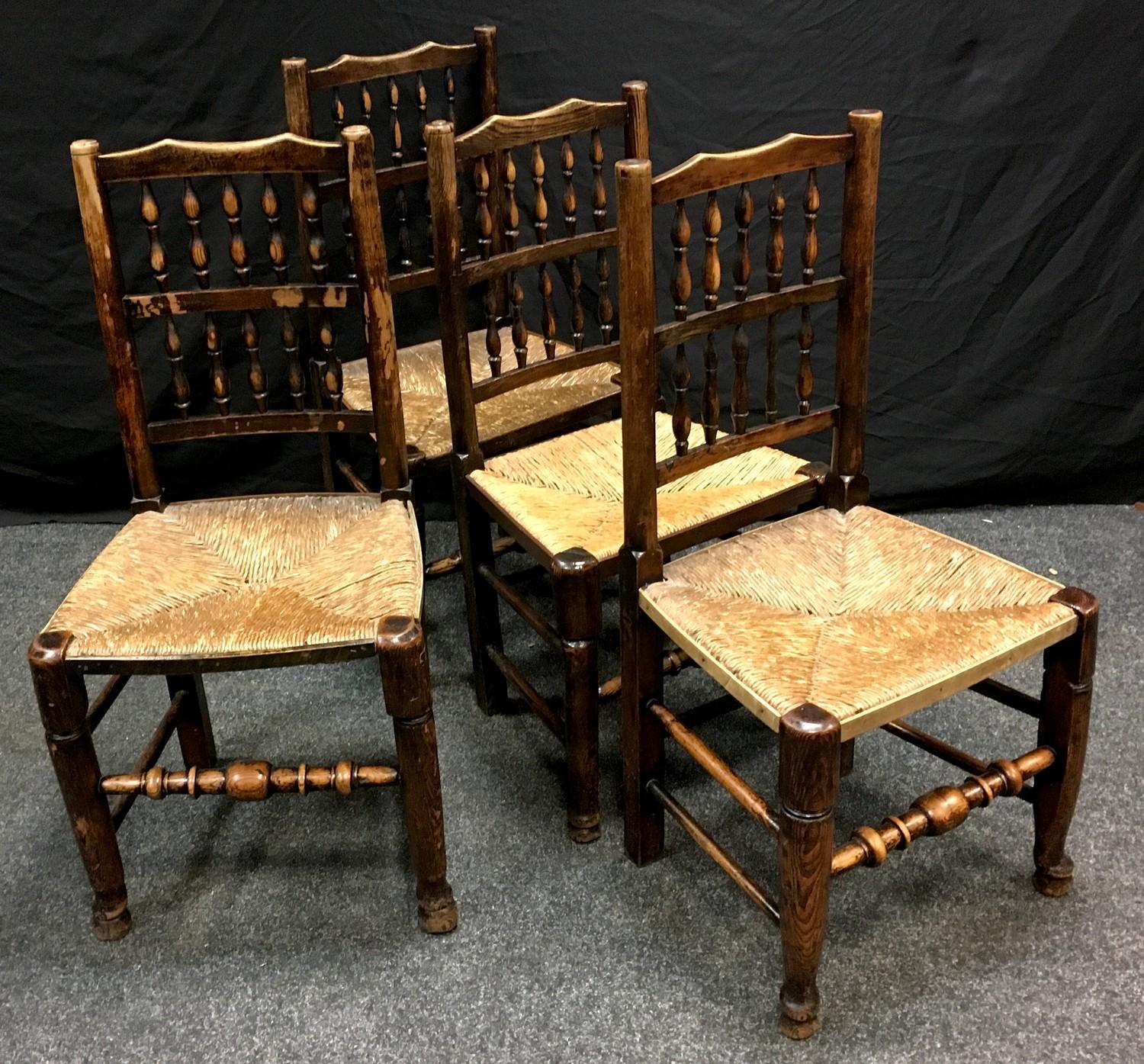 A set of four raffia seated spindle back Lancashire style dining chairs; an oak gate leg table, oval - Bild 2 aus 2
