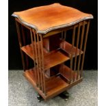 An Edwardian mahogany revolving bookcase.