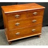 A Victorian stained pine chest of two short drawers over two long, turned feet. 86cm high x 95cm