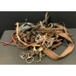 Country pursuits - vintage leather and other horse tack, including bridles, head collars, etc, qty