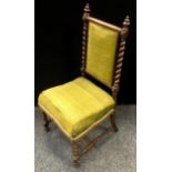 A Victorian rosewood salon chair, turn finials to barley twist uprights, padded back and seat,