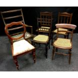 A Parker Knoll rocking chair; a Victorian mahogany balloon back chair; two boudoir chairs with