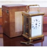 A French lacquered brass carriage clock, 5.5cm rectangular enamel dial inscribed with Roman