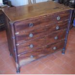 A 19th century chest, possibly Channel Islands, of four long graduated cockbeaded drawers, flanked