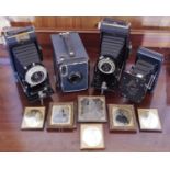 A Kodak Brownie camera; another; Kodak Best Pocket Autographic bellows camera; ambrotypes; etc **