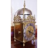A 17th century style brass lantern clock, 13cm silvered dial inscribed Gokdsmiths & Silversmiths,