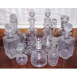 A pair of clear glass decanters, globular stopper; others, various designs; etc **Please note all