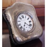 An Edwardian silver travelling timepiece case, 13cm high, Birmingham 1905, enclosing a plated