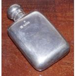 A Victorian silver bowed rectangular hip flask, bayonet cover, 8.5cm high, W & G Neal, London