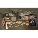 Belts and badges including The Police, Van Halen; Jesus leather belt; native American belt