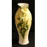 A Graff Porcelain vase, relief decorated with lilies on yellow ground, 43.5cm high