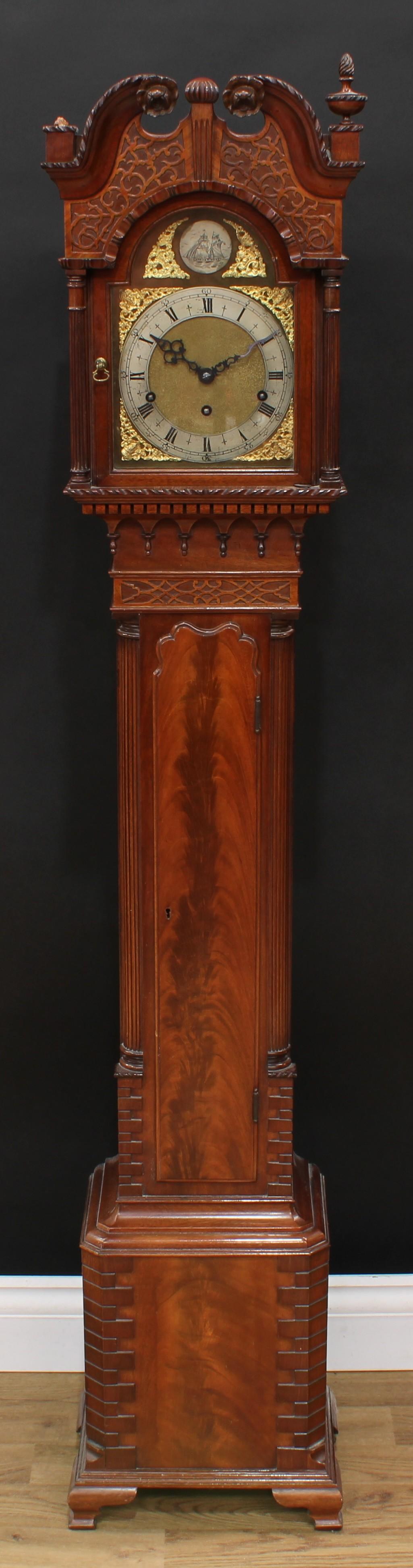 A George III style Chippendale design mahogany dwarf longcase clock, 17cm arched brass dial,