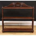 A Regency style mahogany waterfall wall shelf, reeded scroll pediment, spire finials, bobbin-