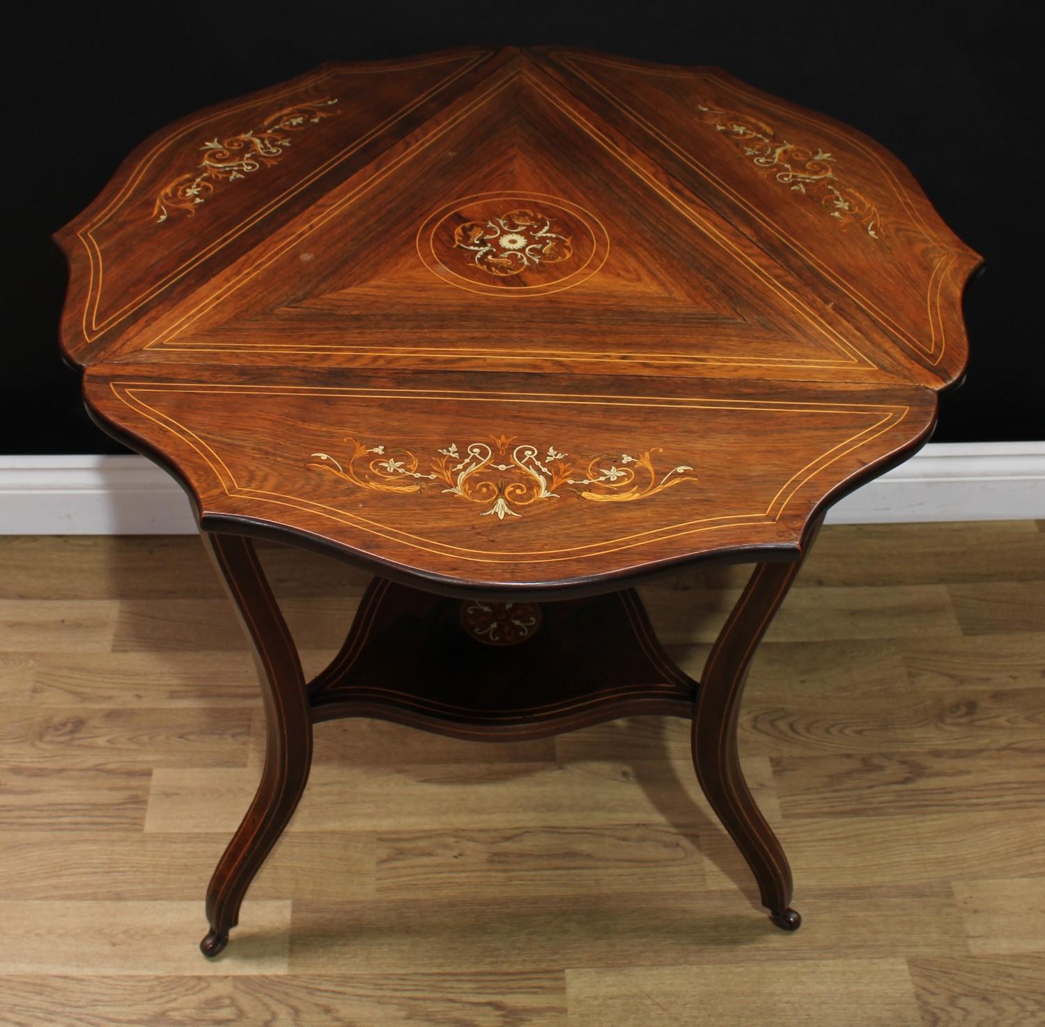 A Sheraton Revival rosewood and marquetry centre table, serpentine circular top with three fall - Image 3 of 3