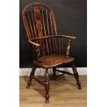 A 19th century country house Windsor elbow chair, hoop back, shaped and pierced splat, bowed mid-
