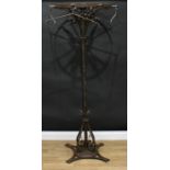 A Gothic design metal hat or coat stand, circular top with eight hanging rods, quatrefoil