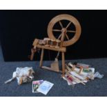 A country cottage spining wheel; assorted accoutrements