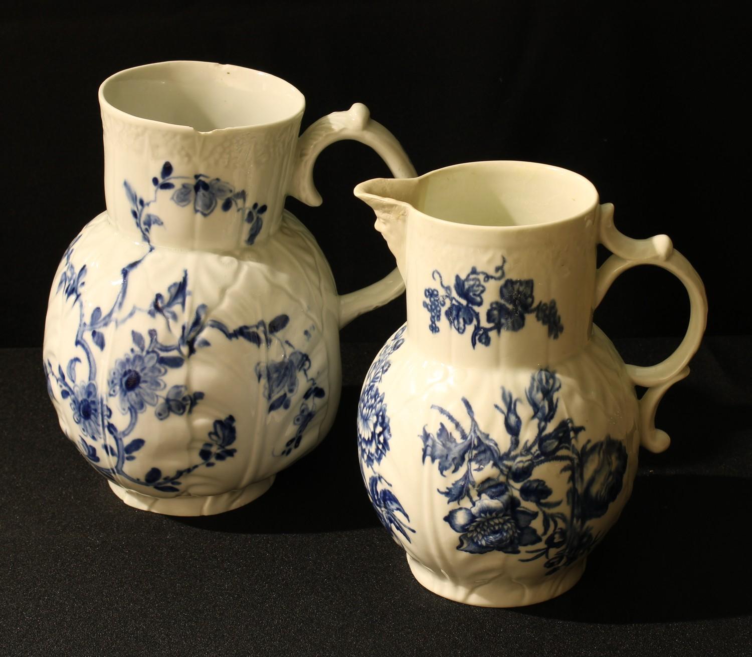 A Worcester Dutch jug, Cabbage Leaf Jug Floral pattern, the baluster moulded in relief with