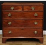 A Regency mahogany chest, flush rectangular top above two short and three long graduated