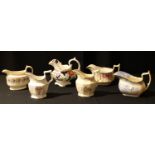 A collection of six early 19th century and later English porcelain cream jugs, various shapes,