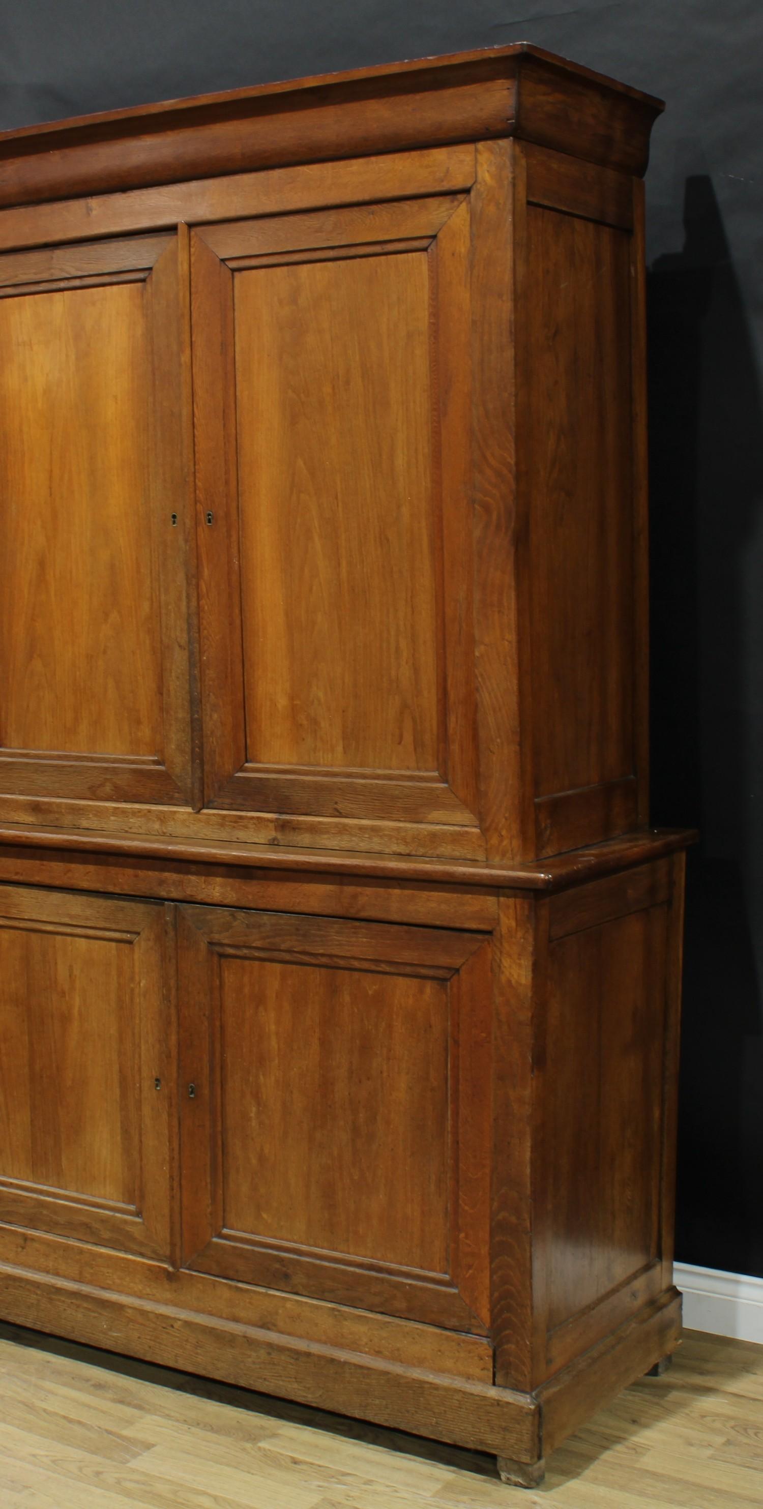 An early 20th century oak housekeeper's cupboard, moulded cornice above a pair of panel doors - Image 3 of 3