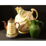 A Torquay Ware conical coffee pot; a Bourne Denby green monochrome jug; a 19th century Rococo