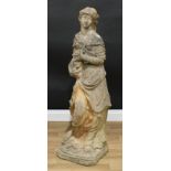 A reconstituted stone garden figure, classical maiden, wearing long flowing robes and clutching a
