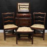 A set of three George III Revival dining chairs, 90cm high, 53cm wide, the seat 37cm deep; a