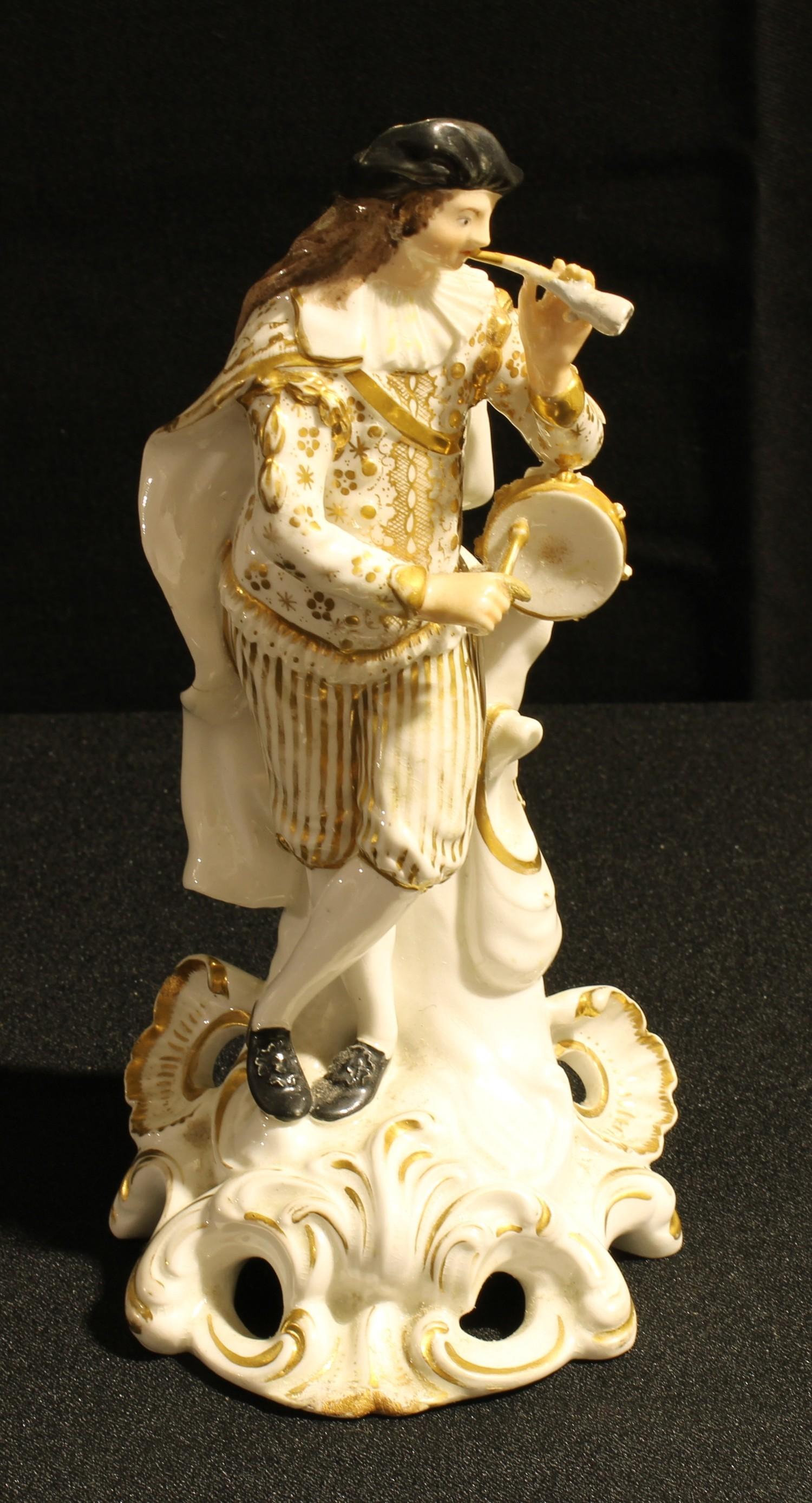 A Bloor Derby figure, of the Male Musician from The Idyllic Musicians, No. 311, modelled holding his