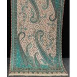 Textiles - a large Paisley shawl or throw, in shades of turquoise, green, salmon and peach on an