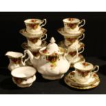 A Royal Albert Old Country Roses tea service for six; a similar trio
