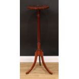 A mahogany tripod statuary pedestal or torchère, dished circular top with satinwood banded edge,