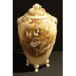 A Japanese Satsuma ovoid vase and cover, applied in raised enamels with a sorcerer on the back of