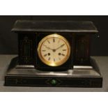A Victorian slate mantel clock, the white enamelled dial with Roman numerals, twin winding holes,