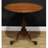 A 19th century mahogany and marquetry tripod occasional table, circular tilting top inlaid with a