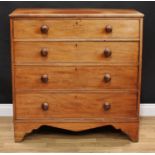 A Victorian mahogany chest, slightly oversailing top above four long graduated cockbeaded drawers,