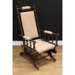 An American design spring rocking chair, turned throughout in the traditional manner, 106.5cm