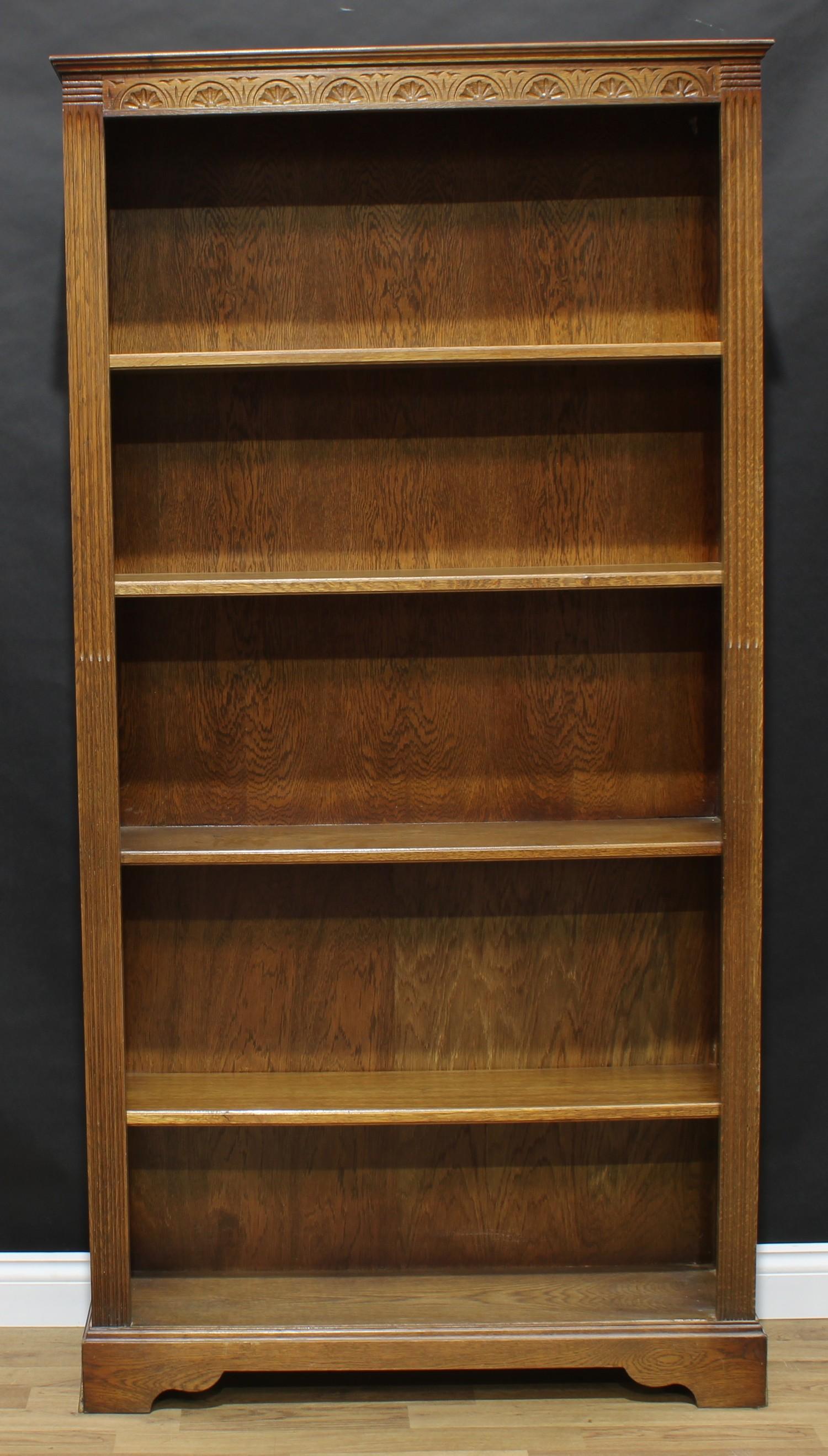 An Old Charm style oak tall open bookcase