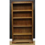 An Old Charm style oak tall open bookcase