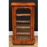 A Victorian walnut and marquetry music room or book cabinet, chamfered rectangular top above a