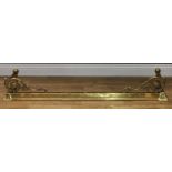 A country house brass fire curb or fender, winged female herm brackets, rope twist sides, 18cm high,