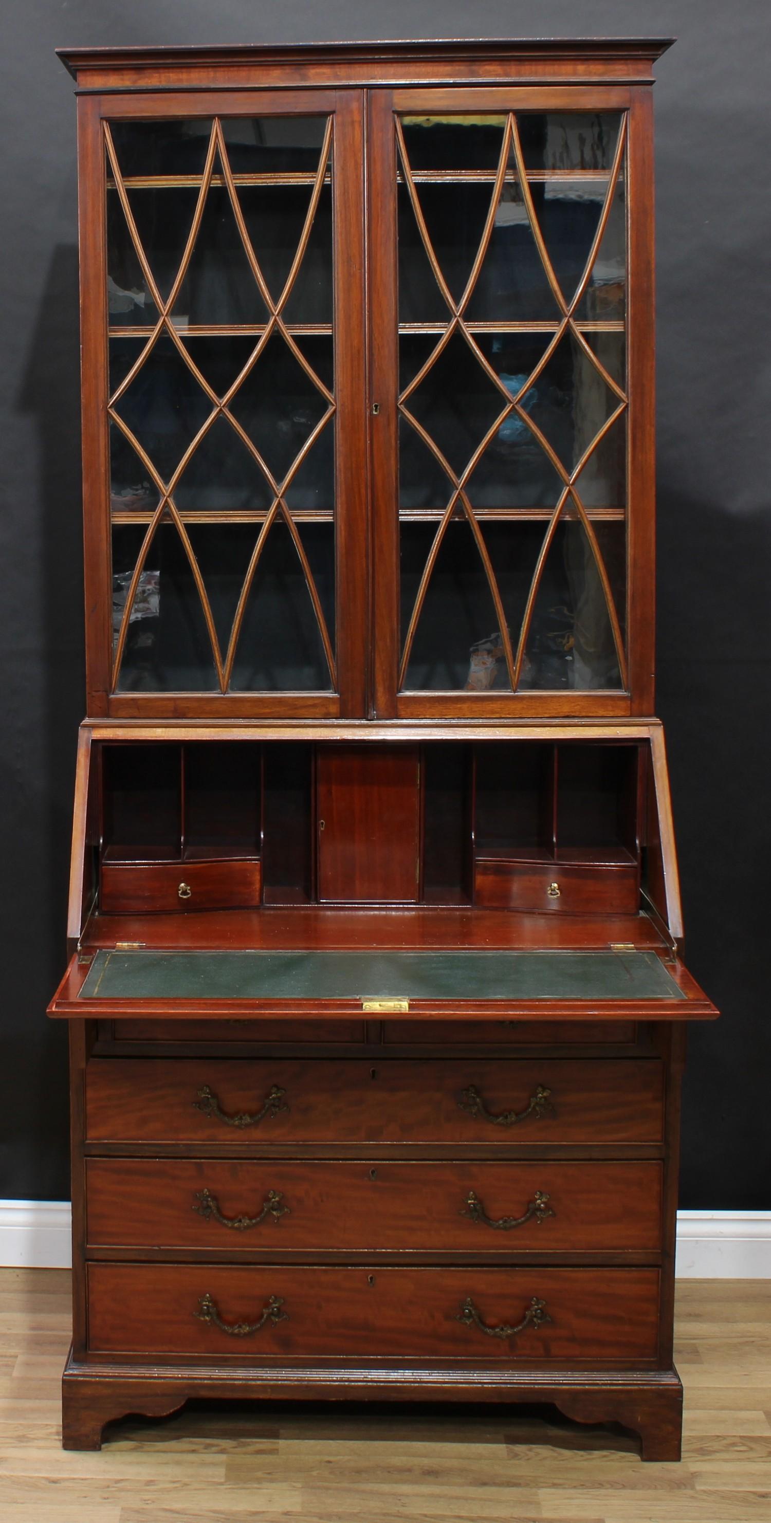 A George III Revival mahogany bureau bookcase, shallow outswept cornice above a pair of glazed doors - Image 2 of 5