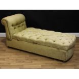 An early 20th century chaise longue day bed ottoman, stuffed-over deep-button upholstery, drop-